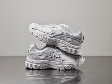 NIKE  White/ Metallic NIKE