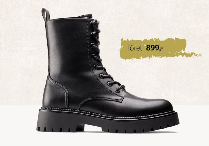 Svart boots fra Unified med snøring og kraftig såle, tidligere priset til 899 kroner, vist mot lys bakgrunn.